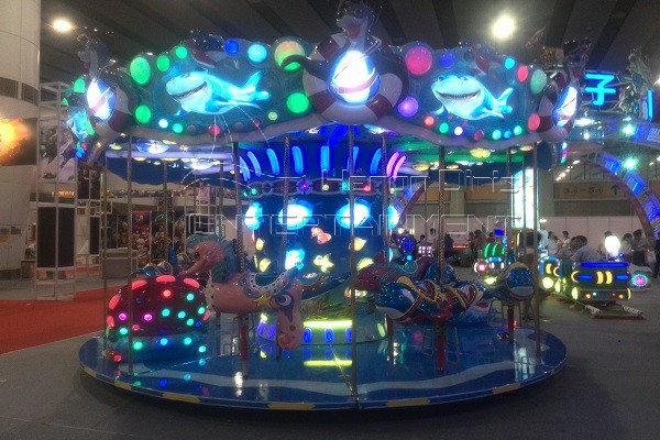 Amusement park ocean carousel with lights